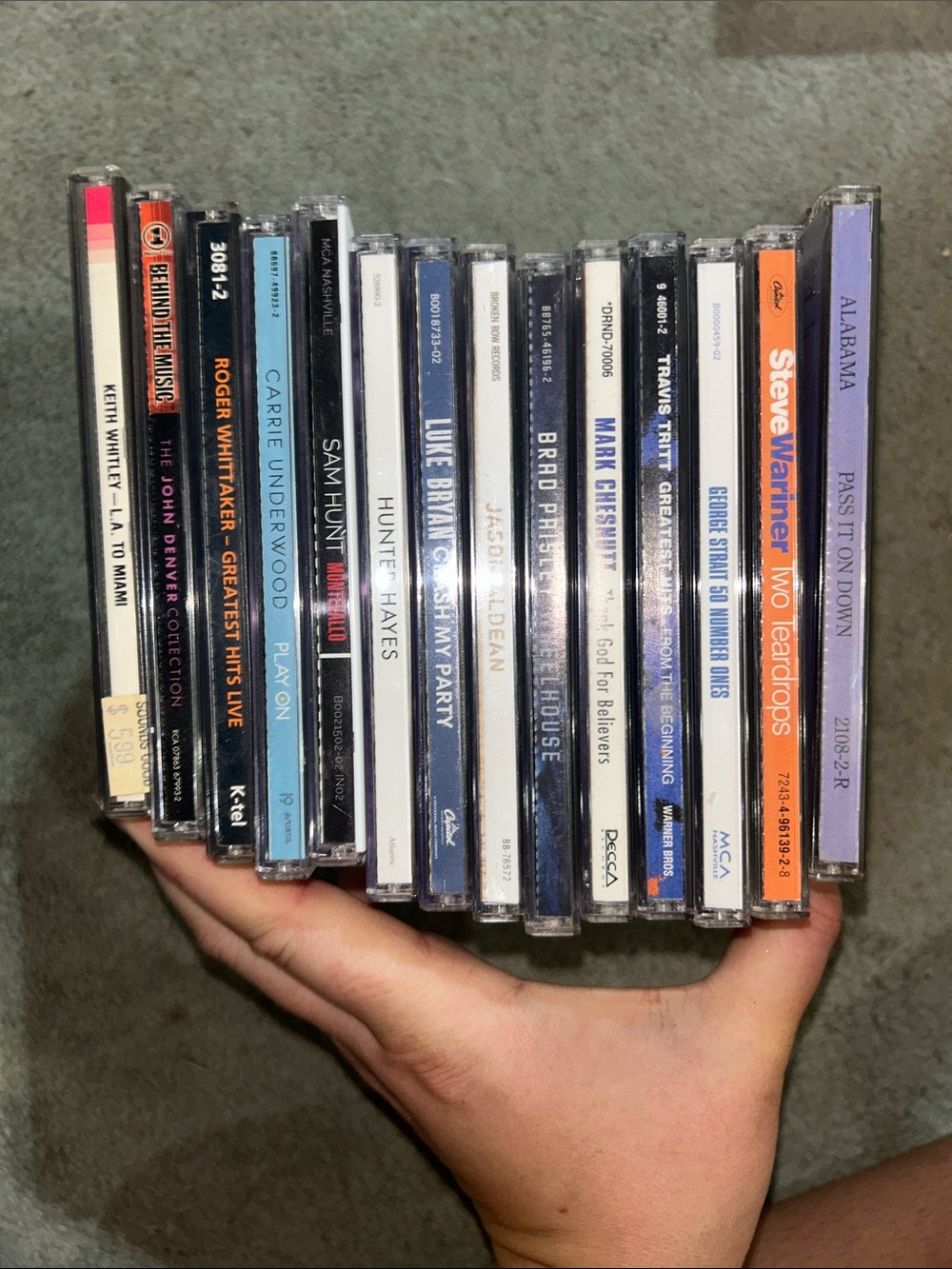 Assortment of 80s, 90s, and 2000s Country Music CDs